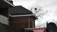 Achterzijde Prins Hendrikkade 13 gefotografeerd vanuit de steeg tussen Prins Hendrikkade en Apolloplantsoen
